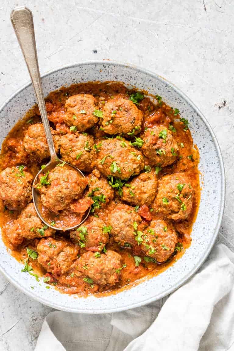 meatballs in a sauce in a bowl - cheap keto recipes