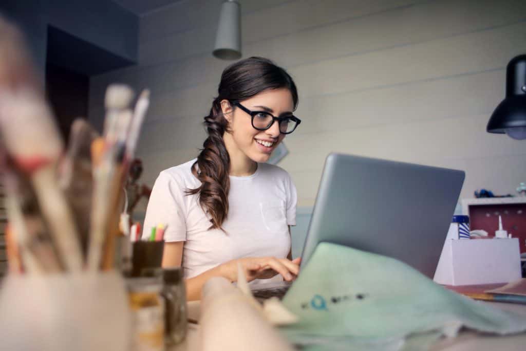 bookkeeper woman working from home on laptop