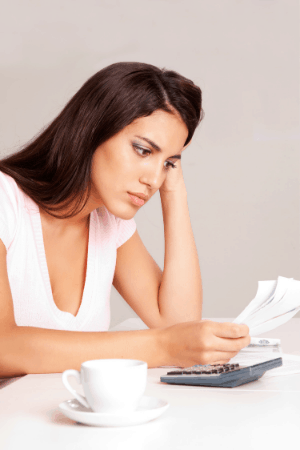 woman doing finances - dave ramsey tips