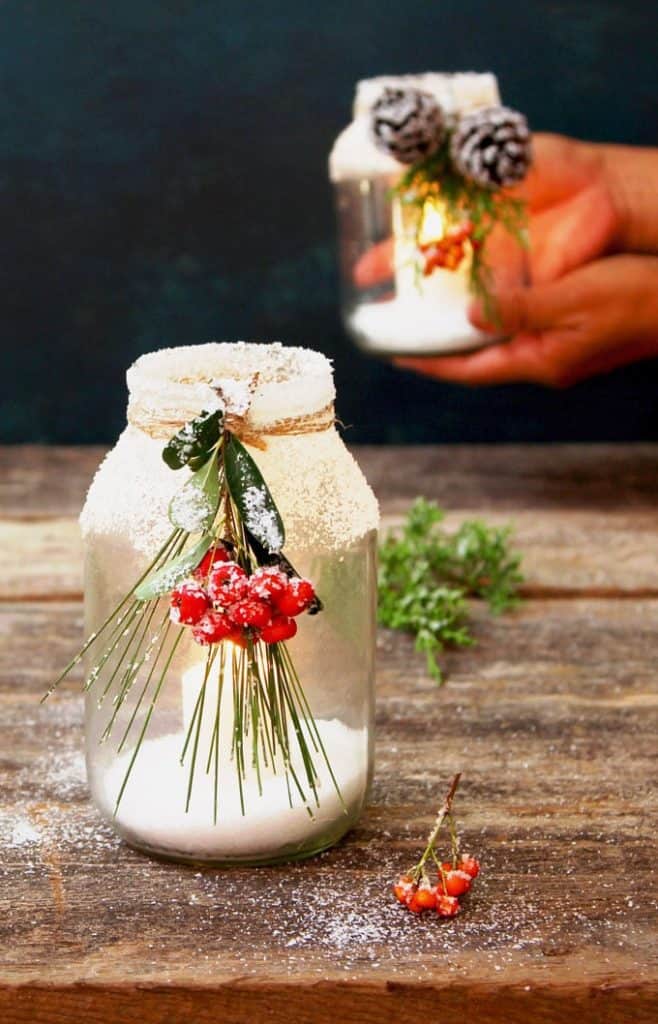 DIY Christmas Decor Projects - snowy mason jay candle holder centerpieces