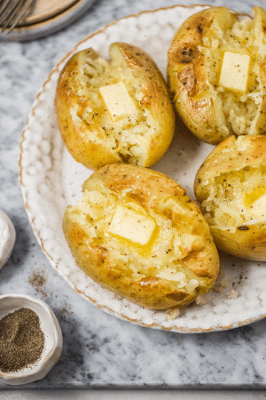 baked potatoes in pan - cheap thanksgiving dinner recipes