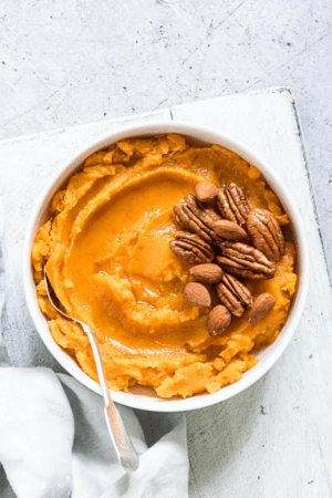 sweet potato mash in bowl - thanksgiving recipes