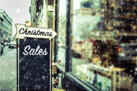 christmas sale sign - holiday budgeting