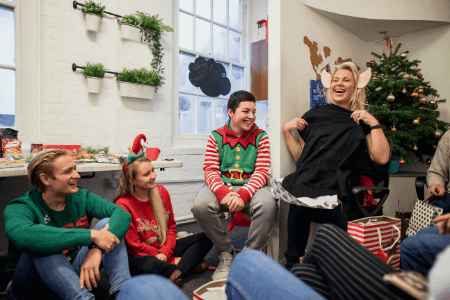 group exchanging christmas gifts