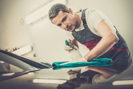 man working on car - under the table jobs