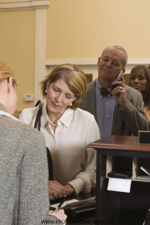 line of people at bank - counter credit 