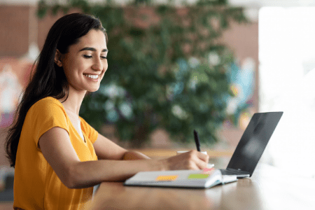 Not wanting to go to work - smiling girl with laptop