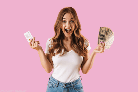 happy woman holding gift card and cash
