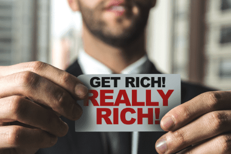 how to get rich overnight (+with no money) - man with get rich sign