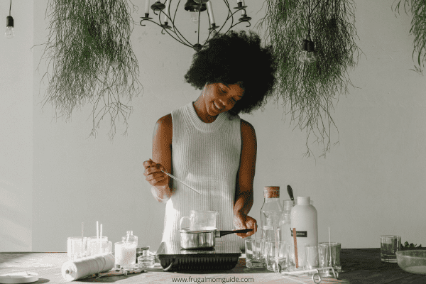 woman making candles to sell