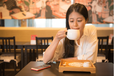 woman with cup of coffee - I don't want to work anymore