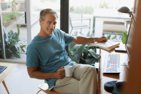 best jobs for retirees - man sitting by a computer