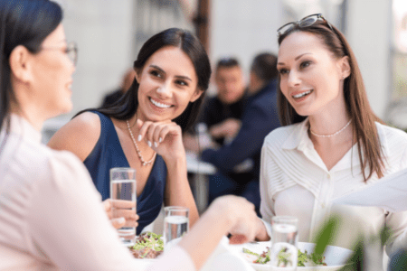 women talking - what do you do for a living answer
