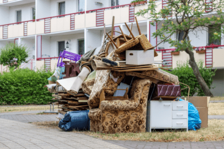 best way to flip money - pile of junk furniture on curb