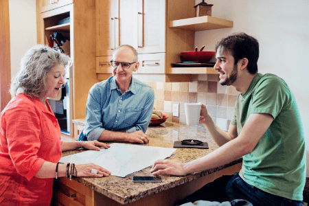 ways to flip money - woman and two men talking in kitchen