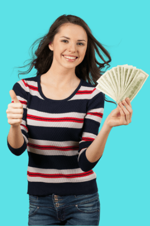 woman holding cash from coinstar near me