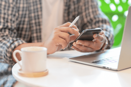 man holding phone and stylus