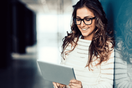 lady with tablet using games to earn money