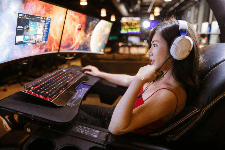 woman on computer playing legit money making games