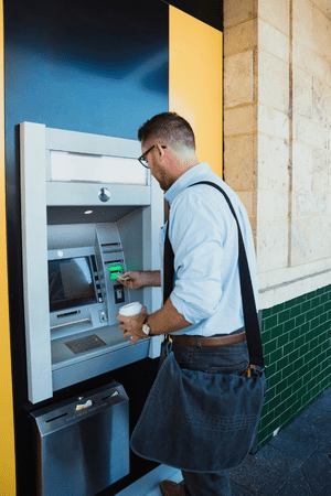 man using free cash app atm