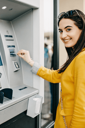 woman using atm