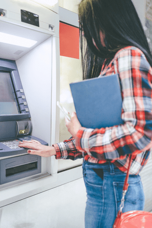 woman using atm