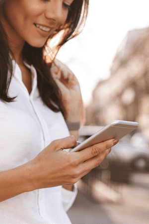 woman on phone doing cash app survey
