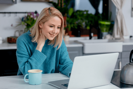 woman working on a laptop at home