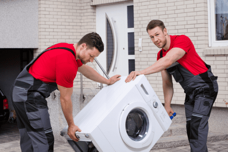 two men with a dryer - who buys appliances near me