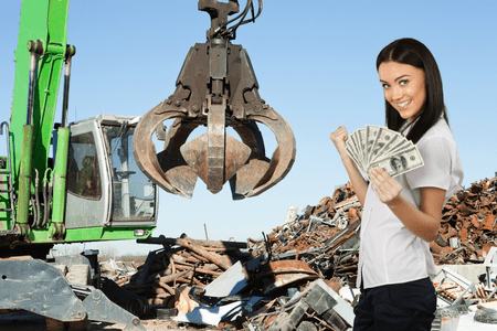 woman with money at steel scrap yard near me