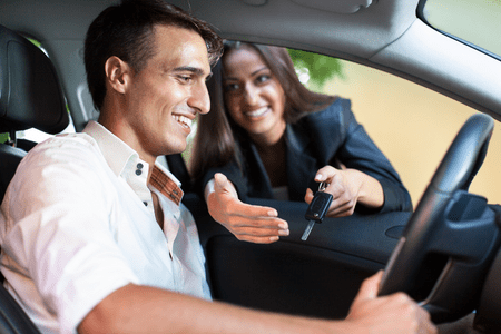 young man getting keys to car after moving out at 18