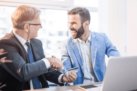 smiling men with bank card and $10 free