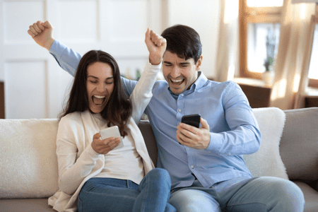 couple excited with real money making games for android