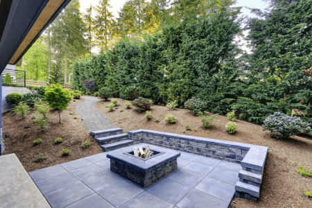 concrete sloped backyard deck ideas