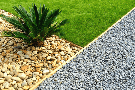 gravel sloped backyard on a budget