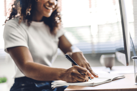 woman writing a business plan