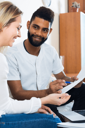 man and woman with documents