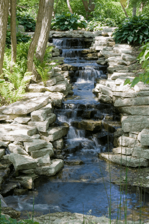 rock waterfall for landscaping a slope on a budget