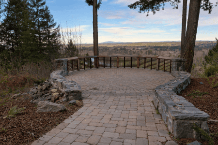 stone sloped backyard deck ideas