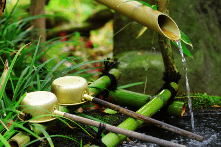 water feature made from pipes and bamboo