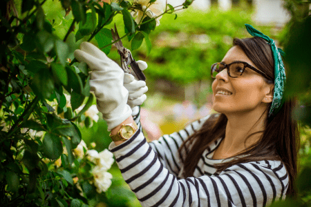 woman working in hillside garden