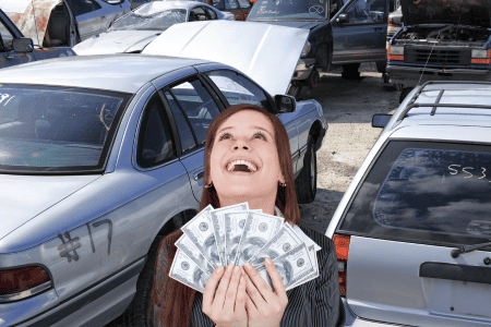 lady with money from selling junk cars without title