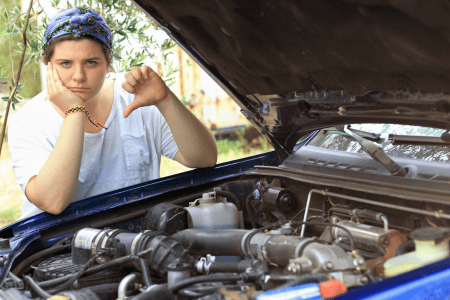 unhappy woman thinking about junk car no title