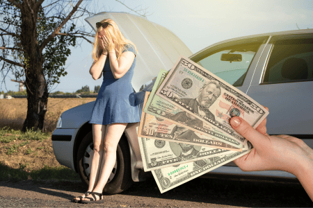 young lady getting $500 cash for junk car