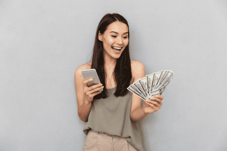 woman on cellphone using best apps for money