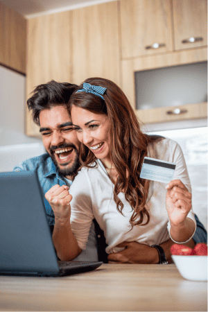 smiling couple shopping online with temu