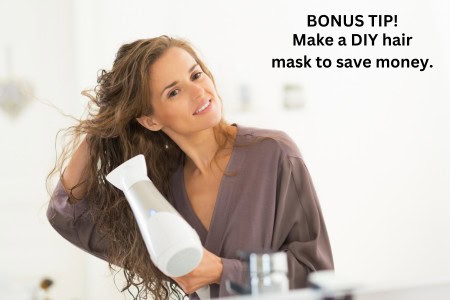 woman blow drying hair