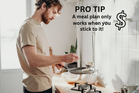 man cooking eggs