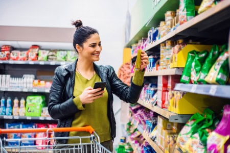 lady looking at dollar tree groceries