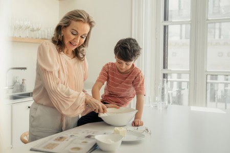 mother and son preparing cheap meals for two